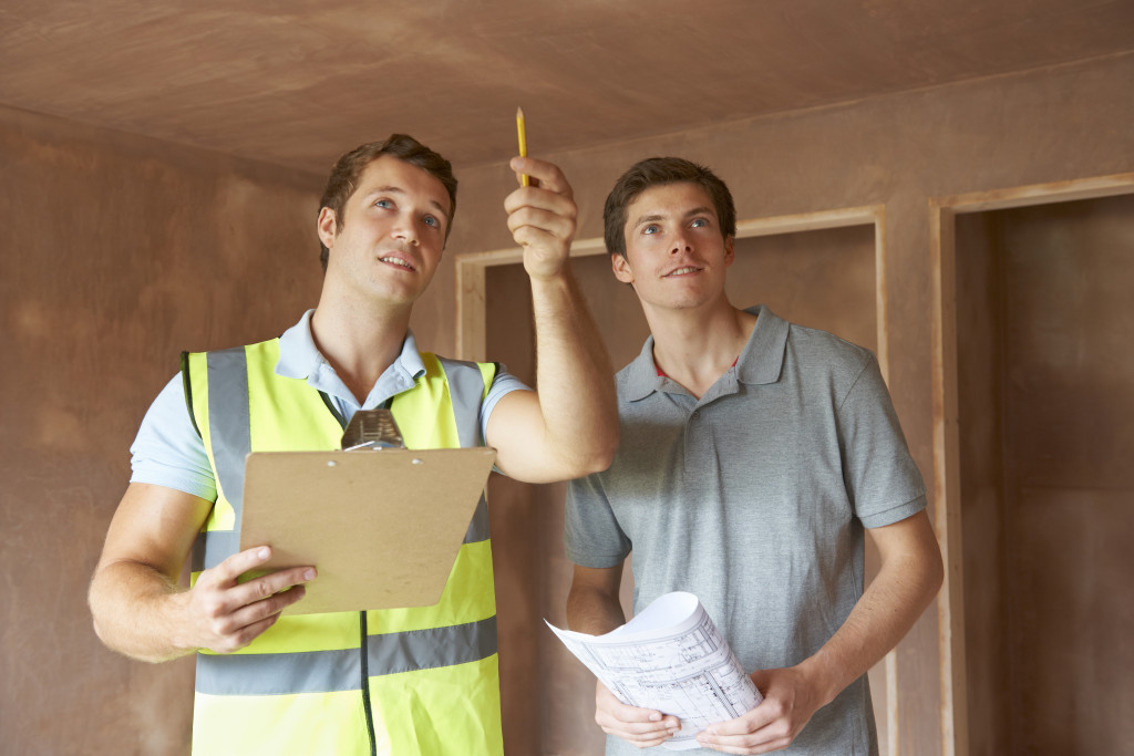 men inspecting a home