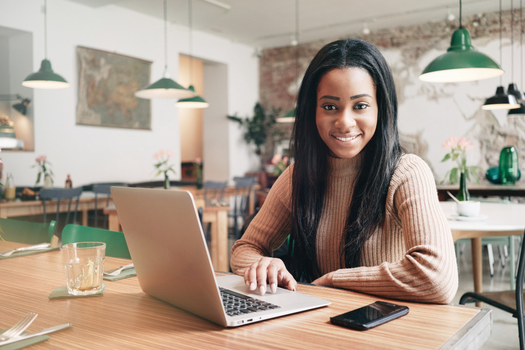 female entrepreneur working on her laptop